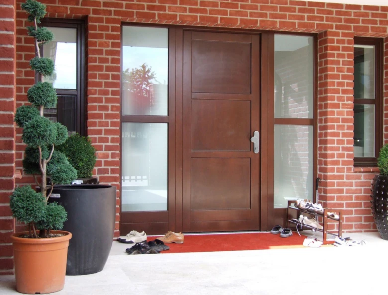 Front door with brick facade
