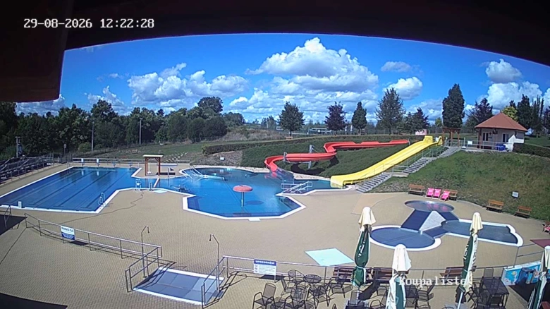 Outdoor swimming pool complex with slides