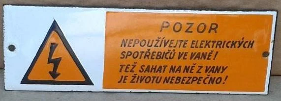Český varovný štít pro elektrické spotřebiče v koupelně.