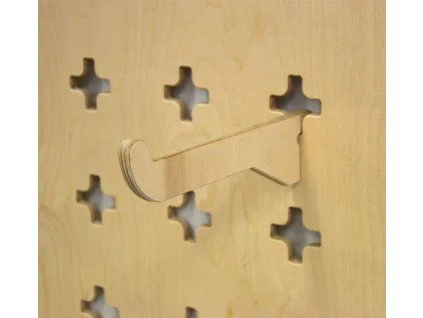 Wooden tool wall with hooks and pegs