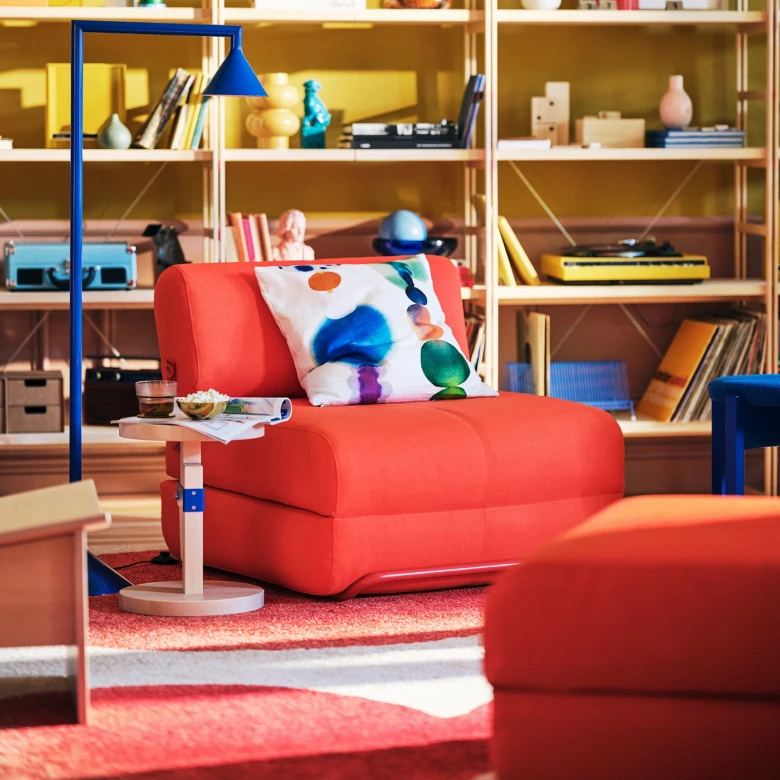 Red recliner chair with pillow
