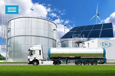 Vodíková elektrárna s solárními panely, větrnými turbínami a nádržemi.