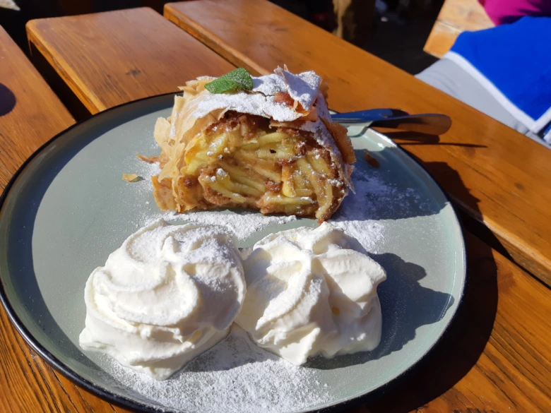 Apple strudel slice with cream