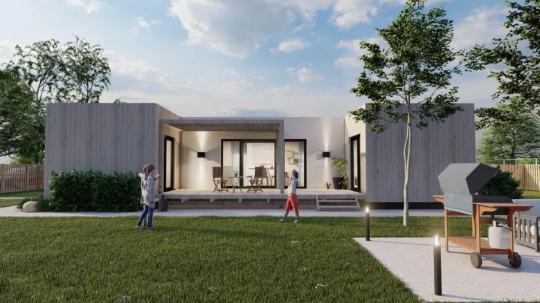 Moderní modulový dům s dřevěným obkladem na pozadí zelené trávníku.