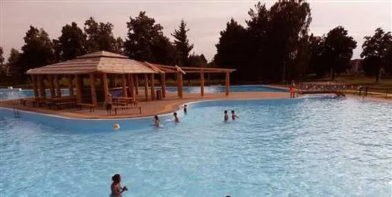 Outdoor swimming pool with pavilion